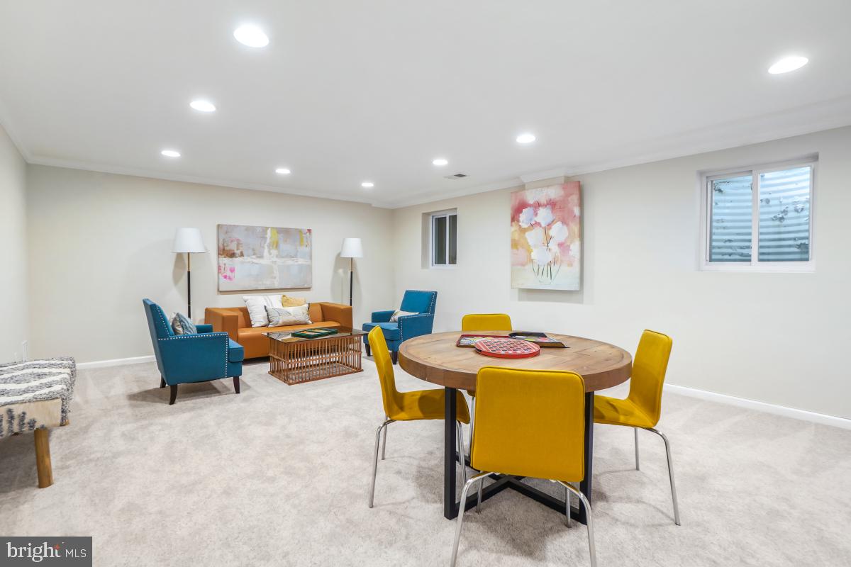 8345 Forrester Boulevard Springfield, VA 22152 - Photo 25 of 30 Finished basement with game area and windows