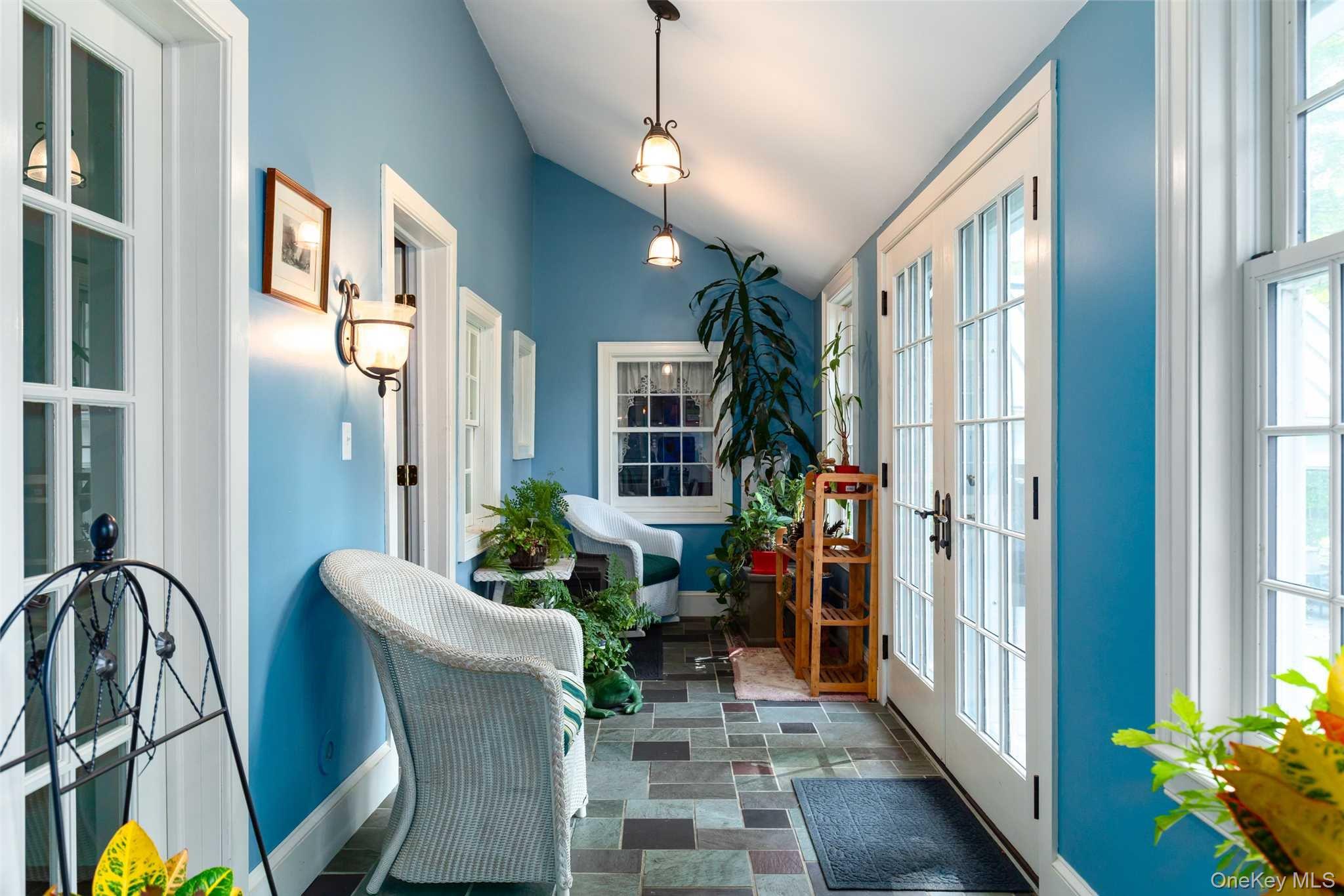 1598 Jackson Corners Road Red Hook, NY 12571 - Photo 12 of 36 a view of a dining room with furniture window and wooden floor