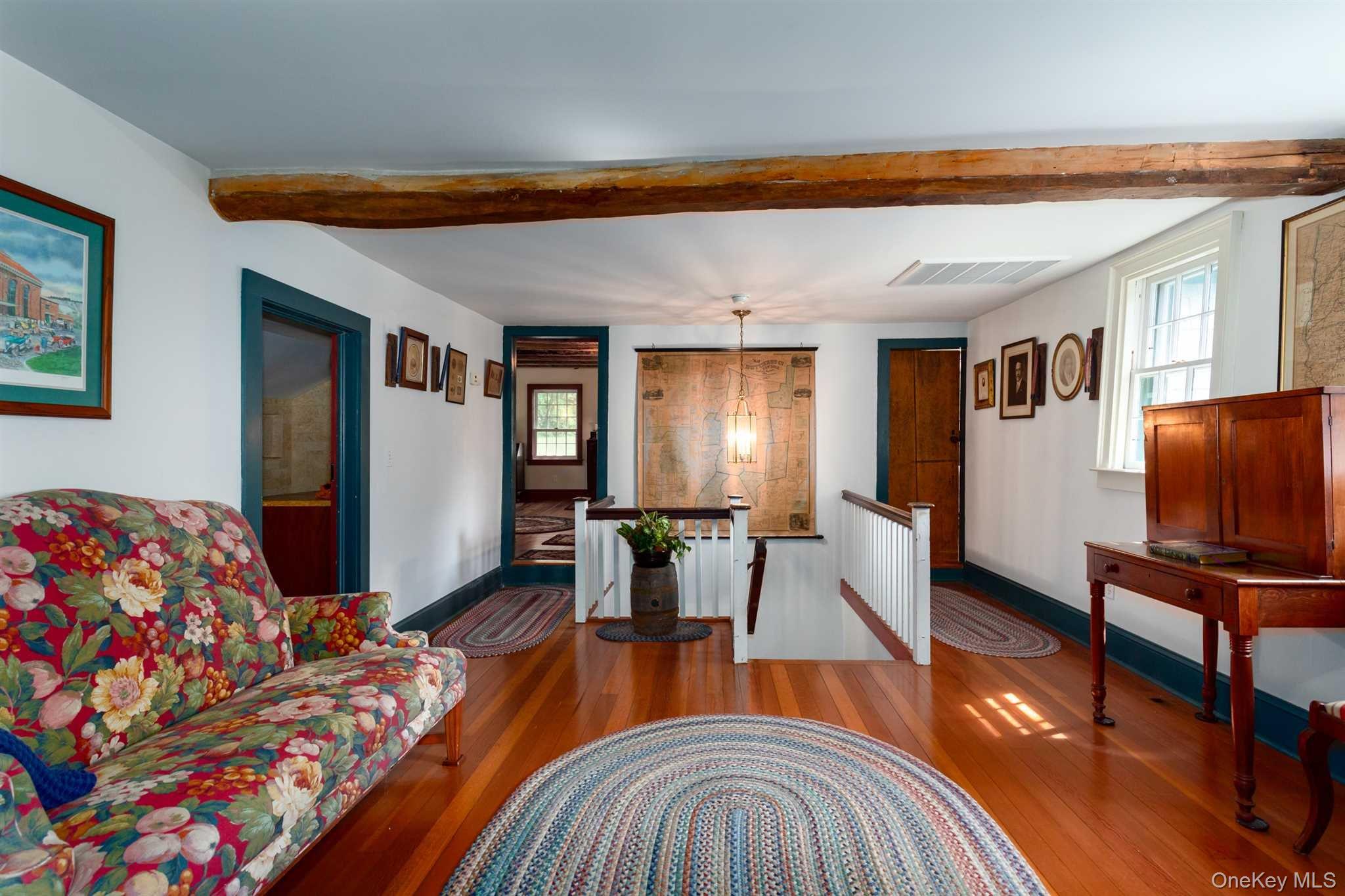 1598 Jackson Corners Road Red Hook, NY 12571 - Photo 13 of 36 a living room with furniture and a flat screen tv