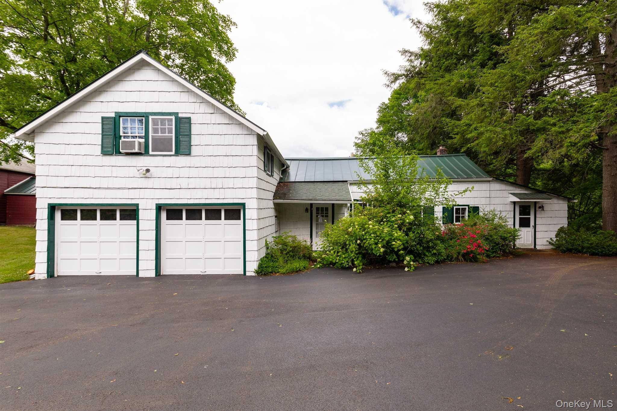 1598 Jackson Corners Road Red Hook, NY 12571 - Photo 20 of 36 a view of a house with a yard and potted plants