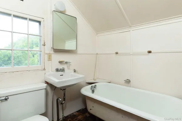 a bathroom with a sink and a bathtub