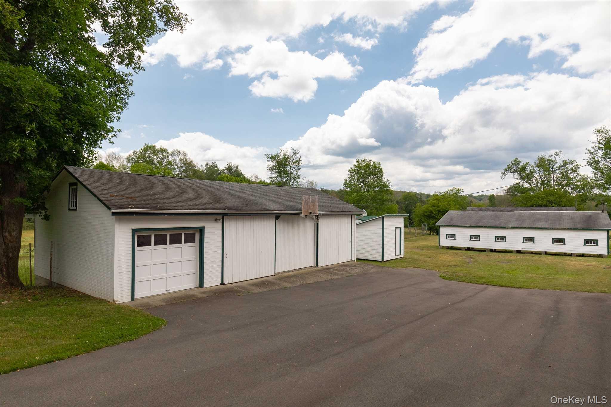 1598 Jackson Corners Road Red Hook, NY 12571 - Photo 31 of 36 a view of a swimming pool with a yard