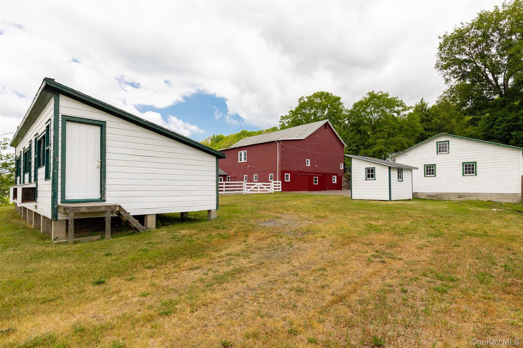 1598 Jackson Corners Road Red Hook, NY 12571 - Photo 32 of 36 a front view of house with yard outdoor seating and barbeque oven