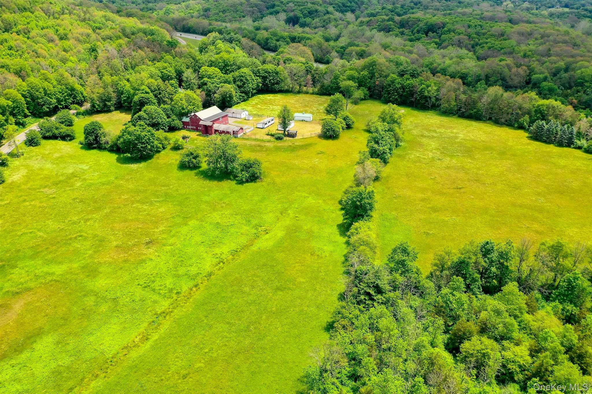 1598 Jackson Corners Road Red Hook, NY 12571 - Photo 35 of 36 a view of a swimming pool with an outdoor space and seating area