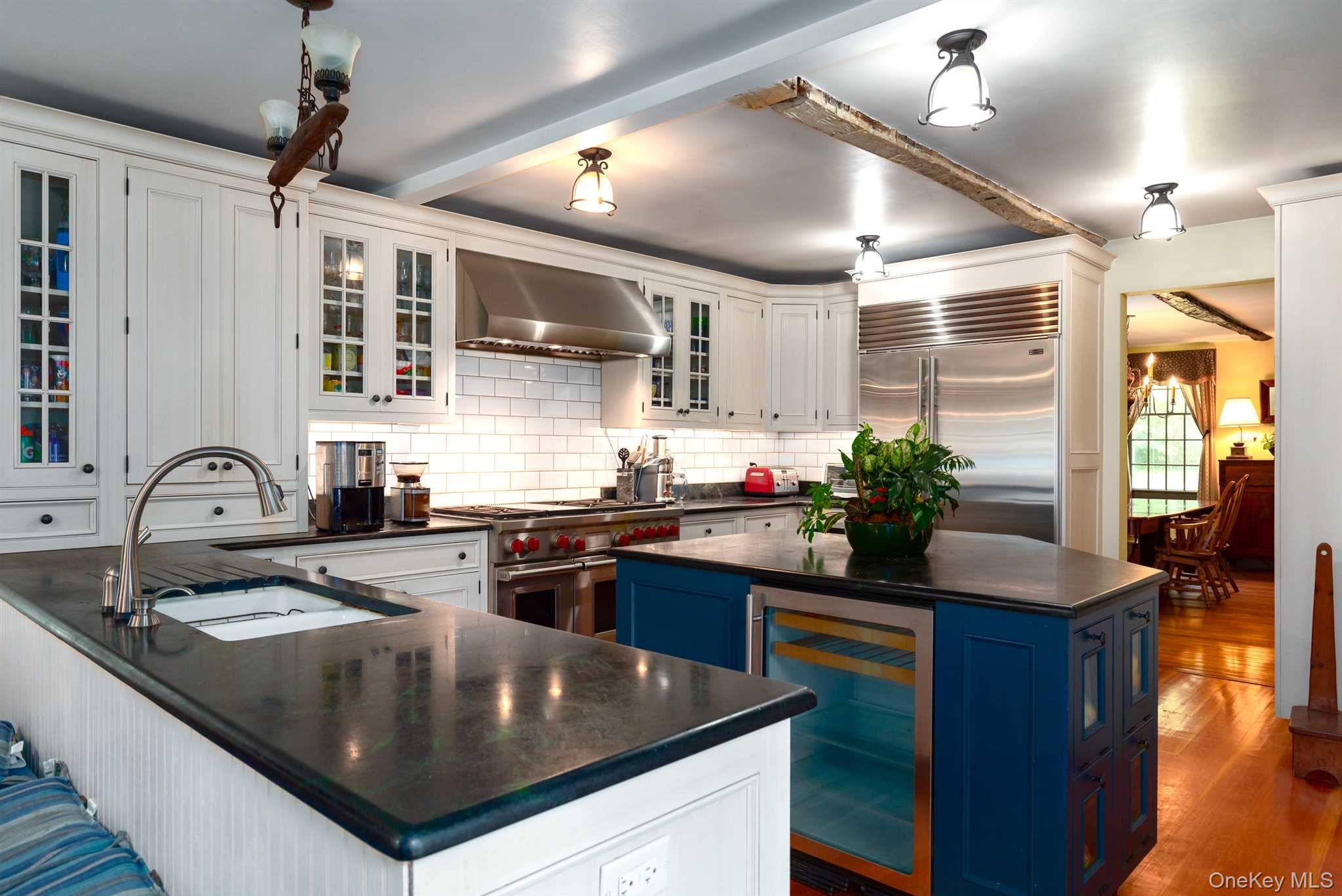 1598 Jackson Corners Road Red Hook, NY 12571 - Photo 4 of 36 a kitchen with stainless steel appliances granite countertop a sink stove and refrigerator