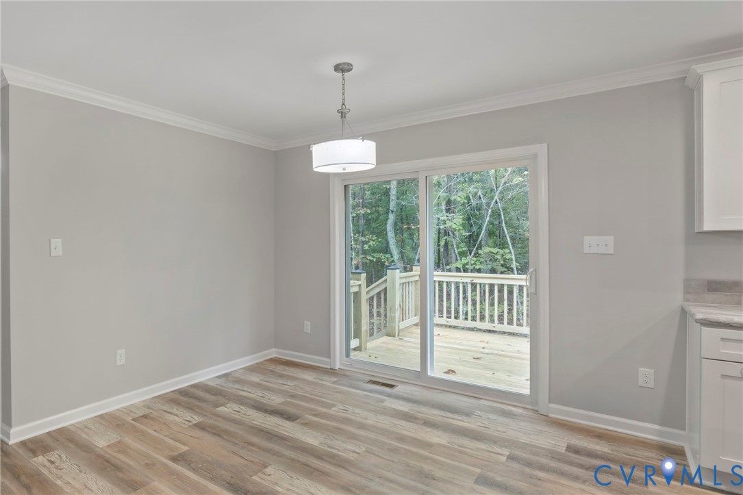 46 Union Church Road Palmyra, VA 22963 - Photo 13 of 50 Unfurnished dining area featuring crown molding an