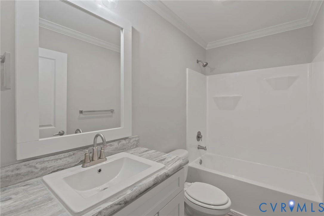 46 Union Church Road Palmyra, VA 22963 - Photo 15 of 50 Bathroom featuring crown molding, shower / bathtub