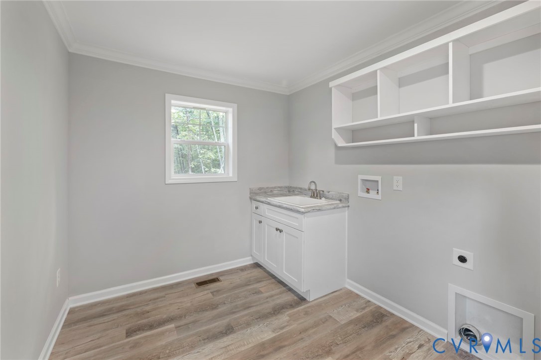 46 Union Church Road Palmyra, VA 22963 - Photo 19 of 50 Laundry room with ornamental molding, light wood-s