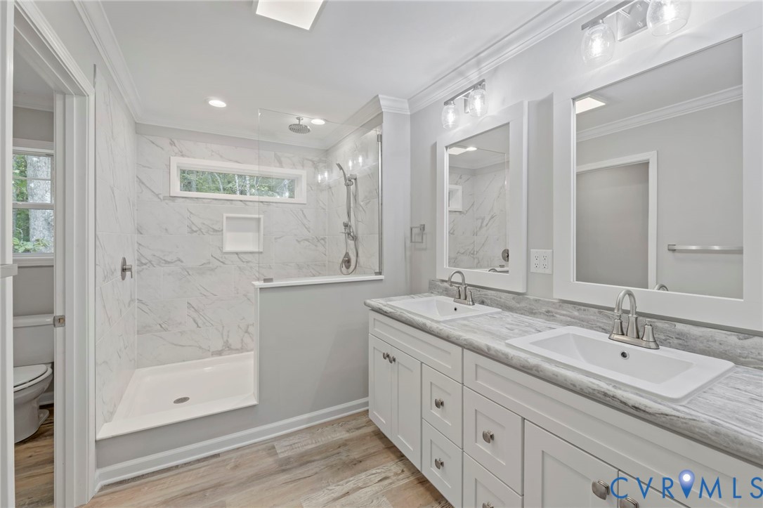 46 Union Church Road Palmyra, VA 22963 - Photo 23 of 50 Bathroom featuring double vanity, a marble finish