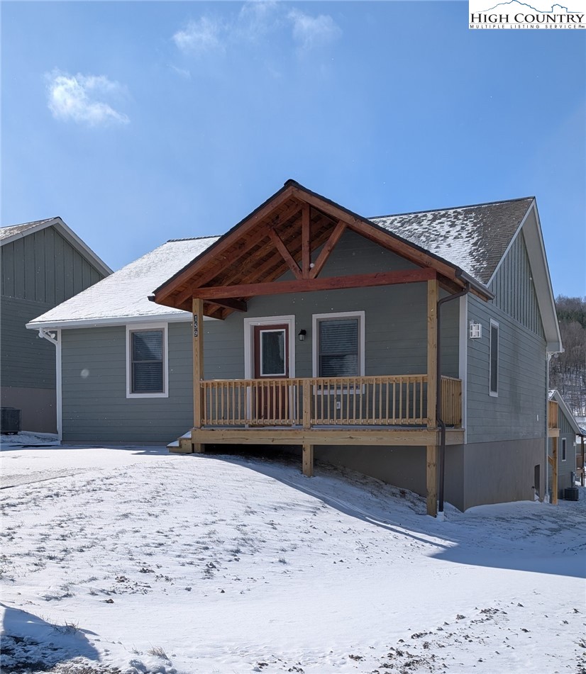 159 Ava Way, Unit 116 Boone, NC 28607 - Photo 2 of 2 a front view of a house with a yard