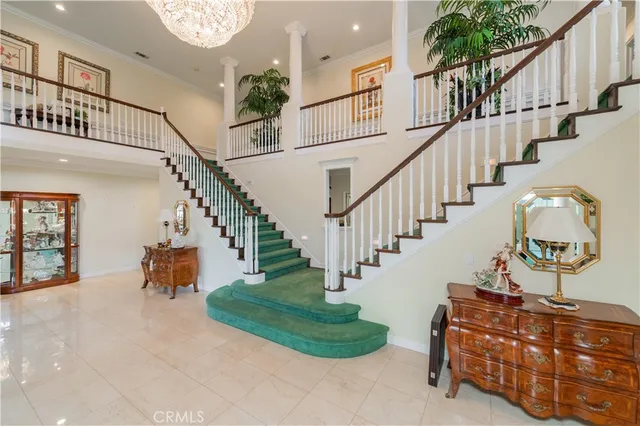 a living room with furniture and white walls