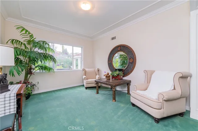 a bathroom with a granite countertop sink toilet a large mirror and shower