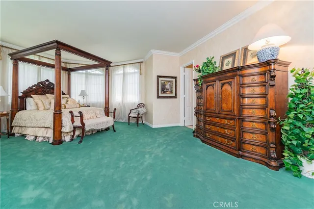 a bed room with a bed and a window