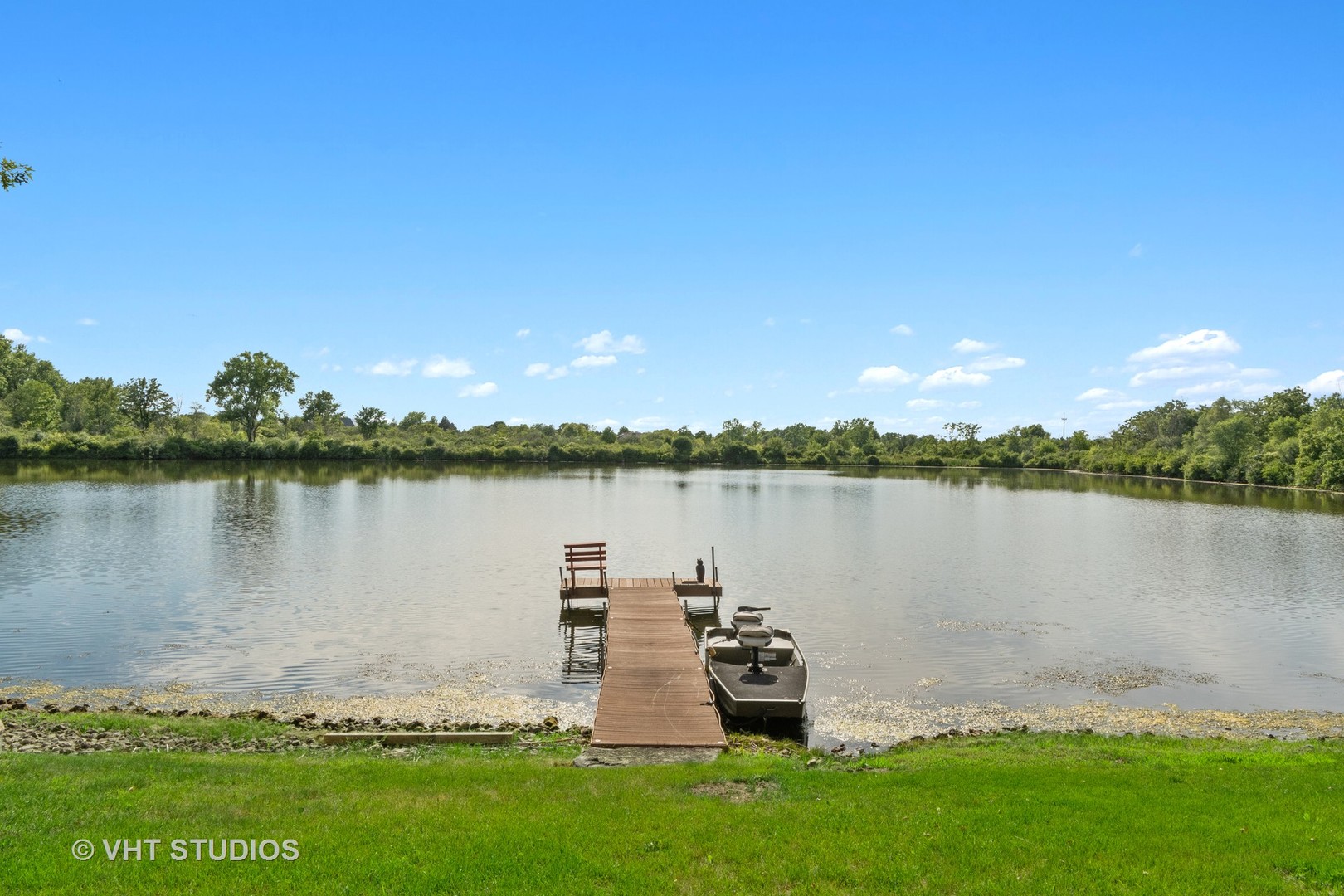 21170 Sage Brush Lane Mokena, IL 60448 - Photo 16 of 66 a view of a lake with houses in the back