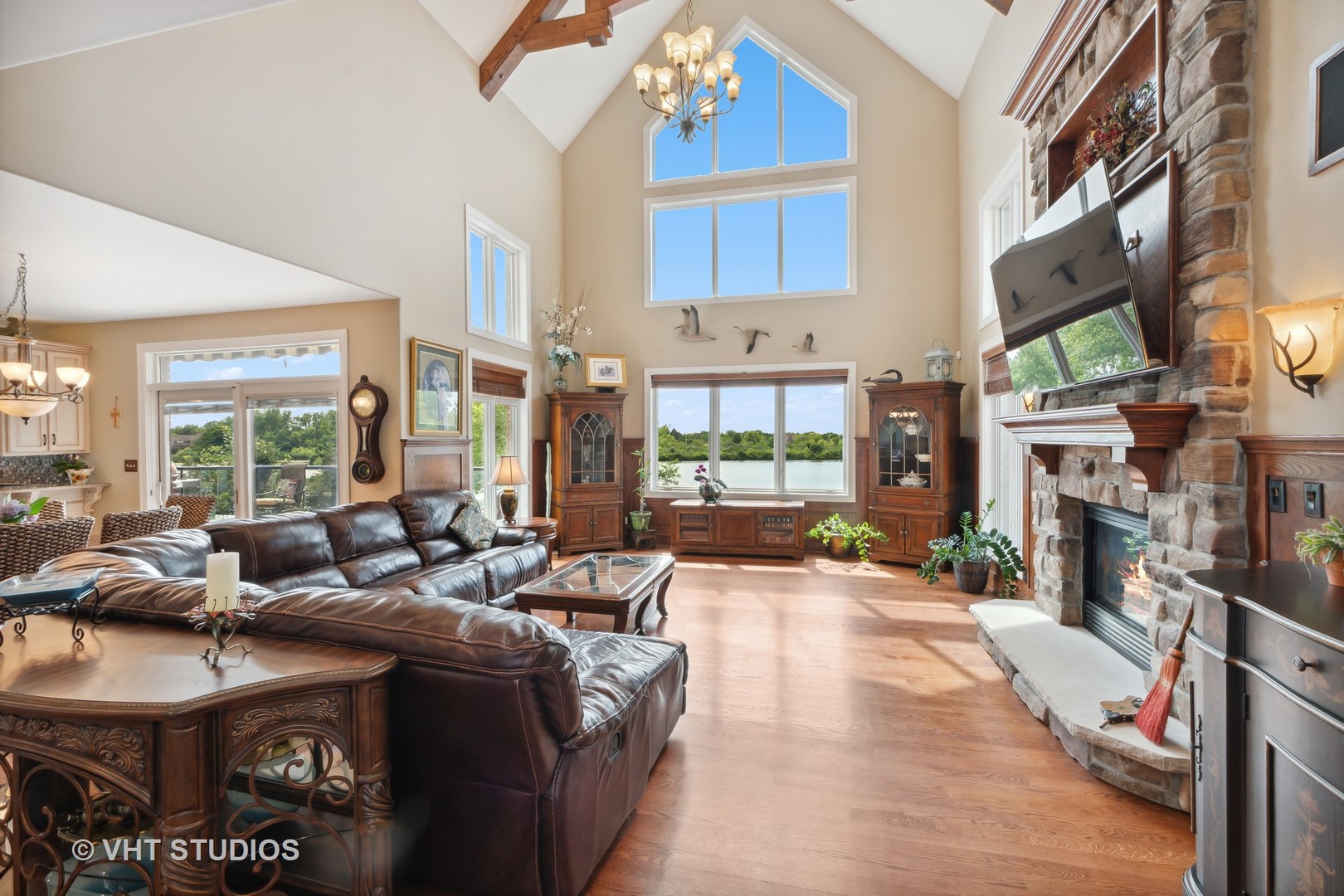 21170 Sage Brush Lane Mokena, IL 60448 - Photo 20 of 66 a living room with fireplace furniture and a flat screen tv