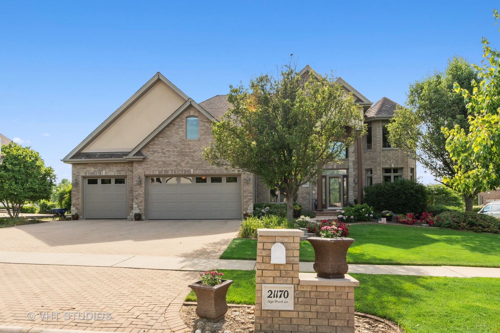 21170 Sage Brush Lane Mokena, IL 60448 - Photo 3 of 66 a front view of house with yard and green space