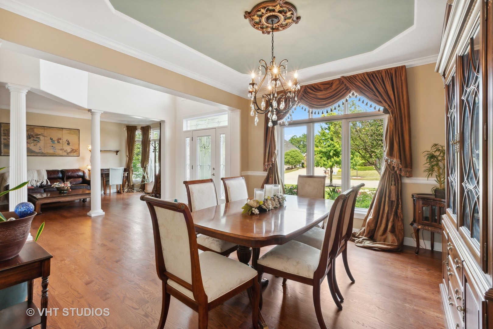 21170 Sage Brush Lane Mokena, IL 60448 - Photo 32 of 66 a view of a dining room with furniture window and wooden floor