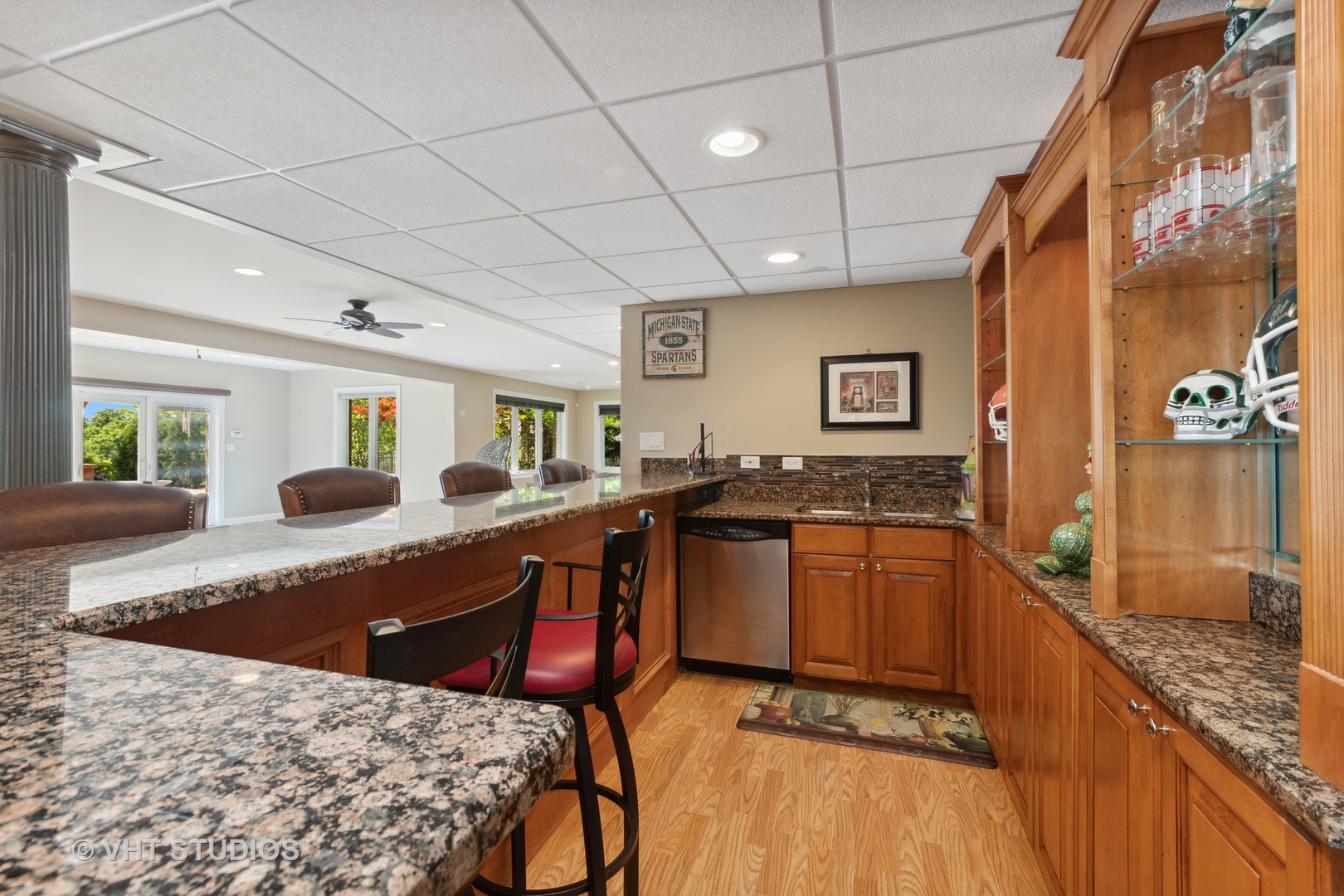 21170 Sage Brush Lane Mokena, IL 60448 - Photo 45 of 66 a large kitchen with stainless steel appliances granite countertop a sink and wooden cabinets