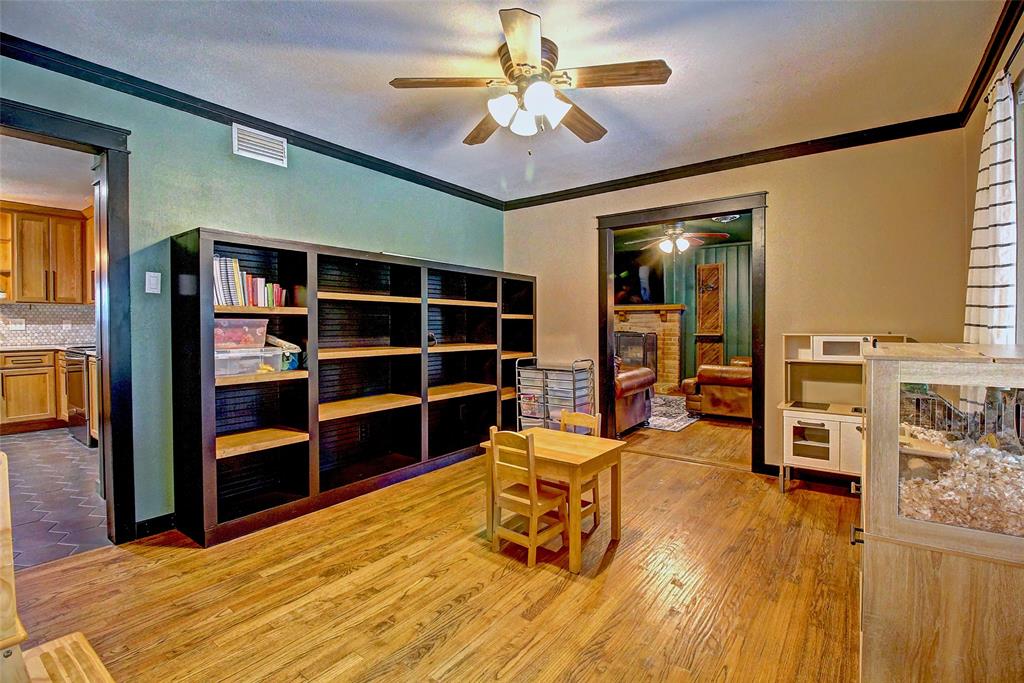 3615 Fritz Lane Corinth, TX 76208 - Photo 13 of 28 a living room with furniture and a flat screen tv