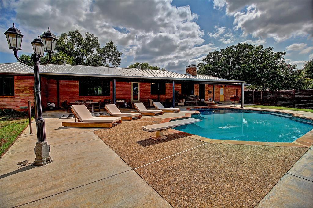 3615 Fritz Lane Corinth, TX 76208 - Photo 26 of 28 a view of a swimming pool with seating space