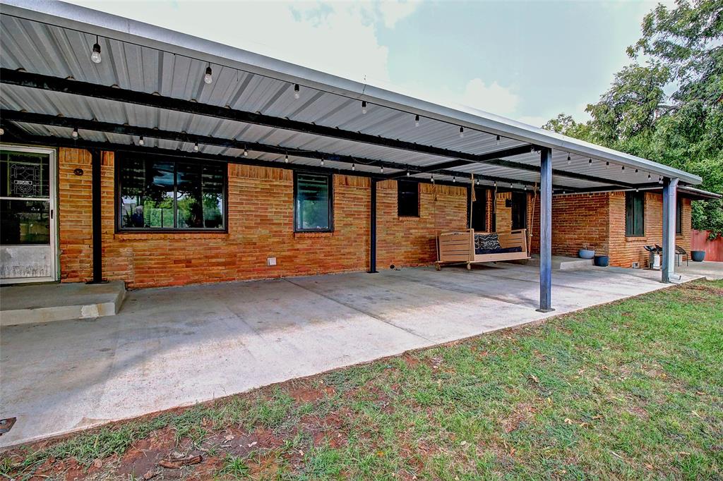 3615 Fritz Lane Corinth, TX 76208 - Photo 3 of 28 a front view of a house with garden