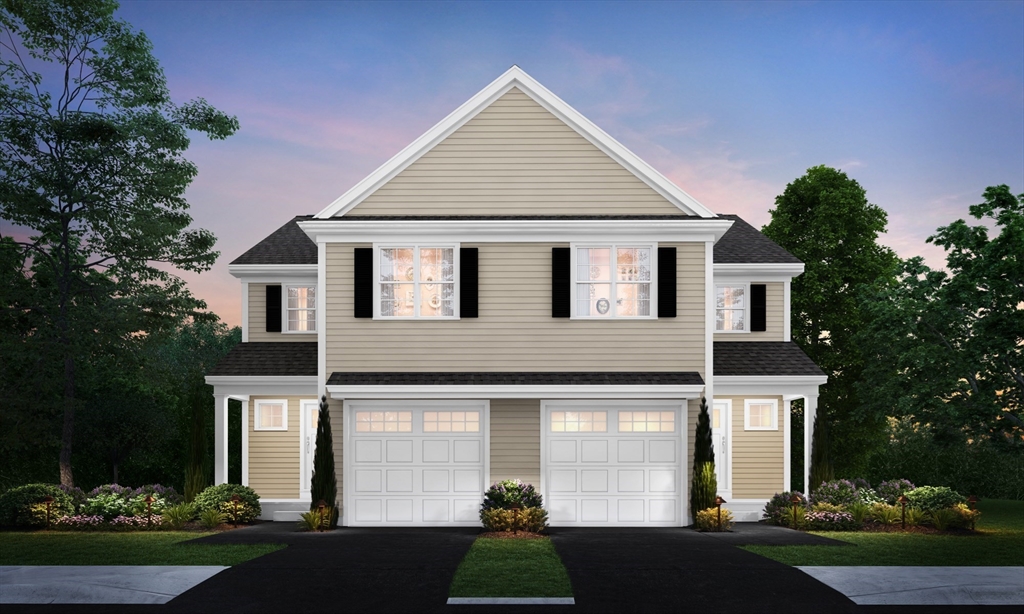 5 Eagle Brook Boulevard, Unit 125 Wrentham, MA 02093 - Photo 1 of 9 a front view of a house with garden