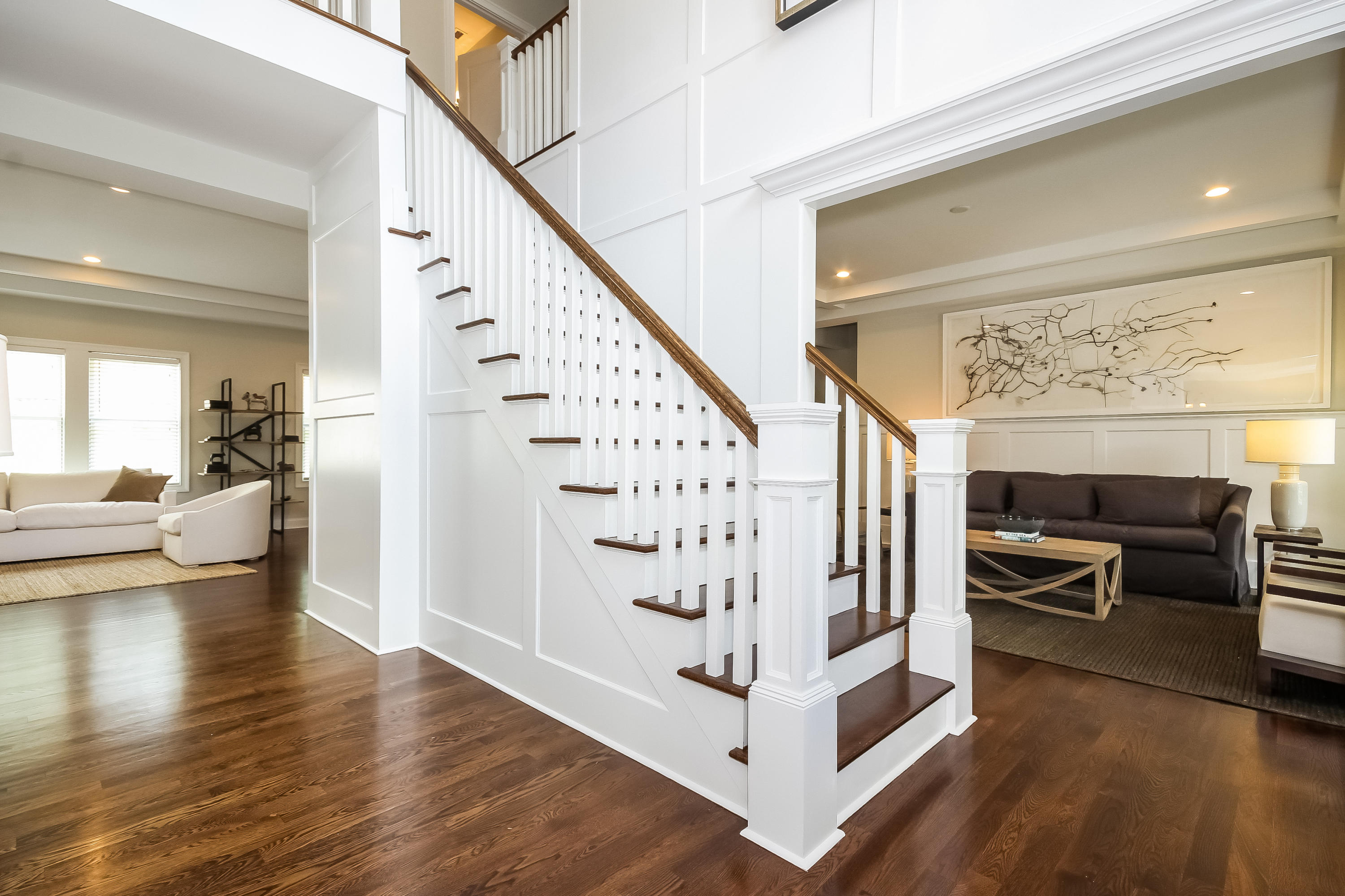 100 Leeuwarden Road Darien, CT 06820 - Photo 5 of 70 a view of a livingroom with furniture and staircase