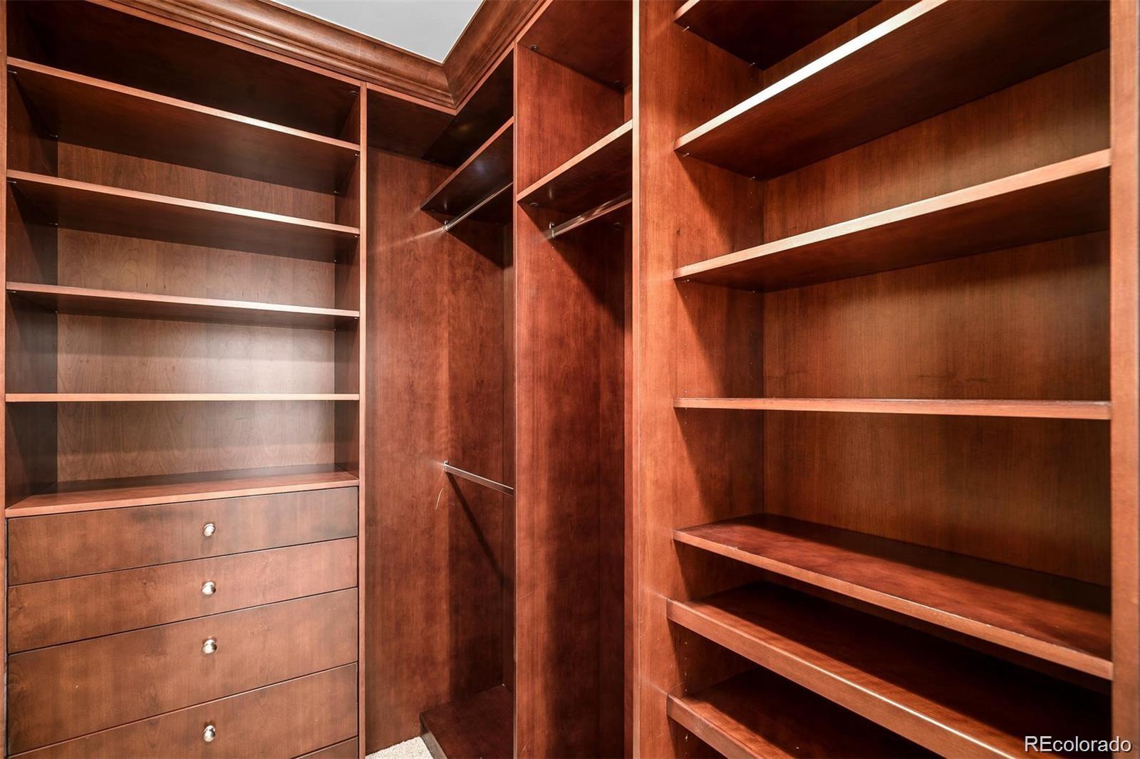 1891 Curtis Street, Unit 1607 Denver, CO 80202 - Photo 21 of 47 a view of walk in closet with empty racks