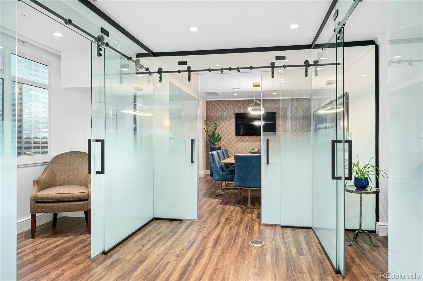 1891 Curtis Street, Unit 1607 Denver, CO 80202 - Photo 37 of 47 a bathroom with a shower and a glass door