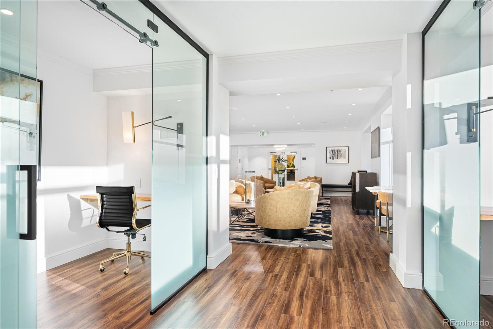 1891 Curtis Street, Unit 1607 Denver, CO 80202 - Photo 38 of 47 a living room with furniture and a wooden floor
