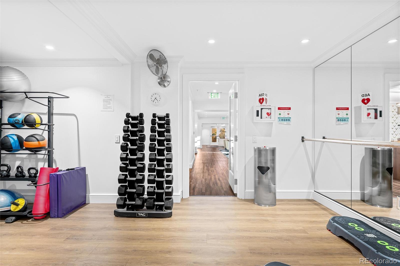 1891 Curtis Street, Unit 1607 Denver, CO 80202 - Photo 43 of 47 a view of an entryway with wooden floor