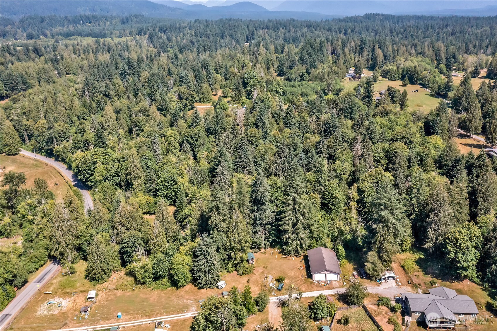 28215 Southeast 216th Street Maple Valley, WA 98038 - Photo 18 of 21 an aerial view of a house with a yard