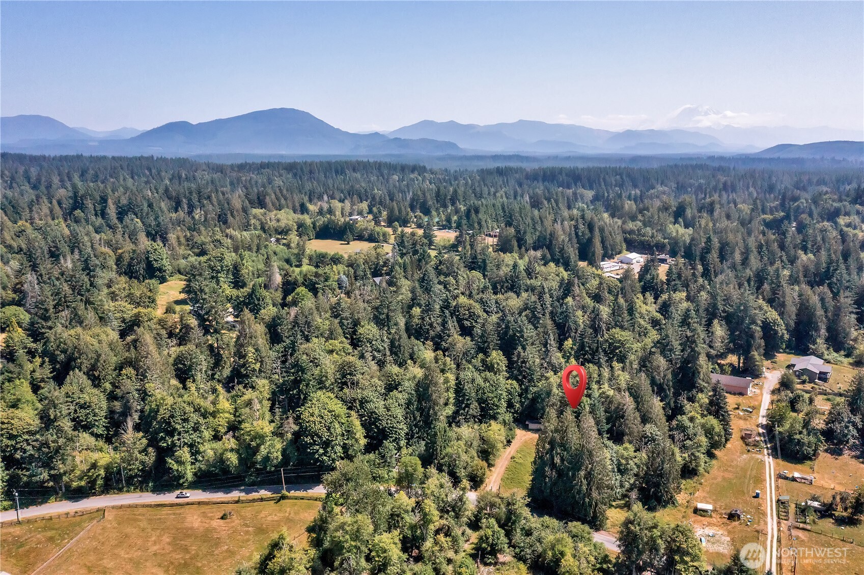 28215 Southeast 216th Street Maple Valley, WA 98038 - Photo 5 of 21 a view of a town with mountains in the background