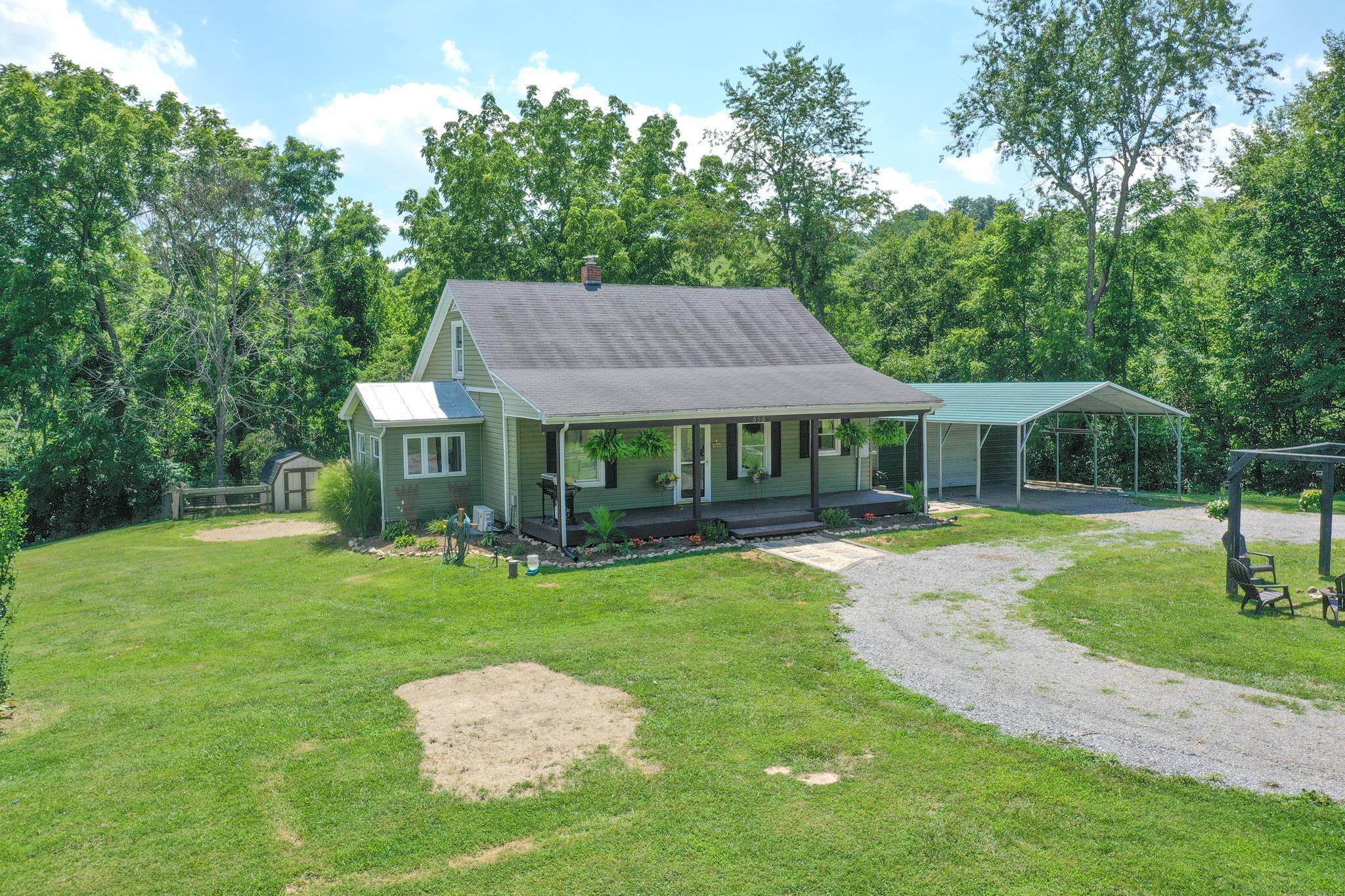 555 Dabneys Road Raphine, VA 24472 - Photo 1 of 30 a front view of a house with garden