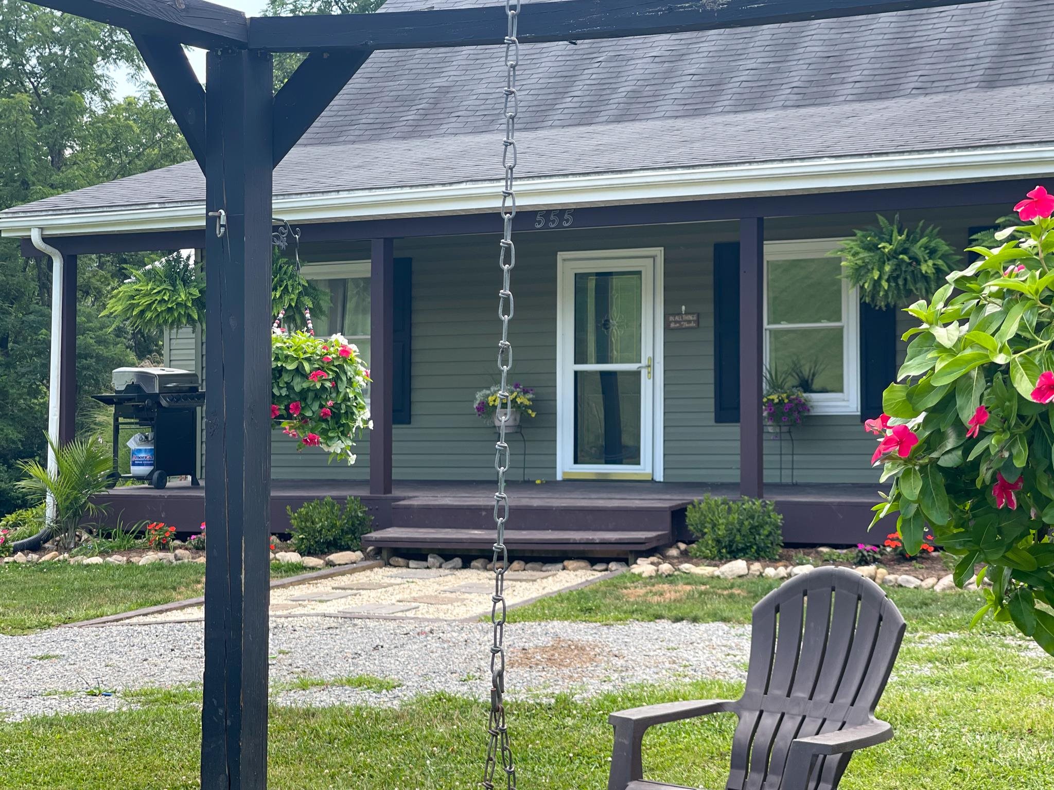 555 Dabneys Road Raphine, VA 24472 - Photo 5 of 30 a front view of a house with garden