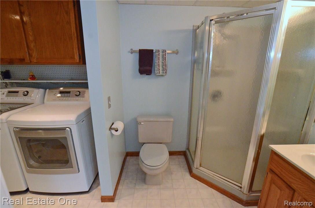 9537 Klais Road Clarkston, MI 48348 - Photo 14 of 24 Basement Bath - Laundry.jpg
