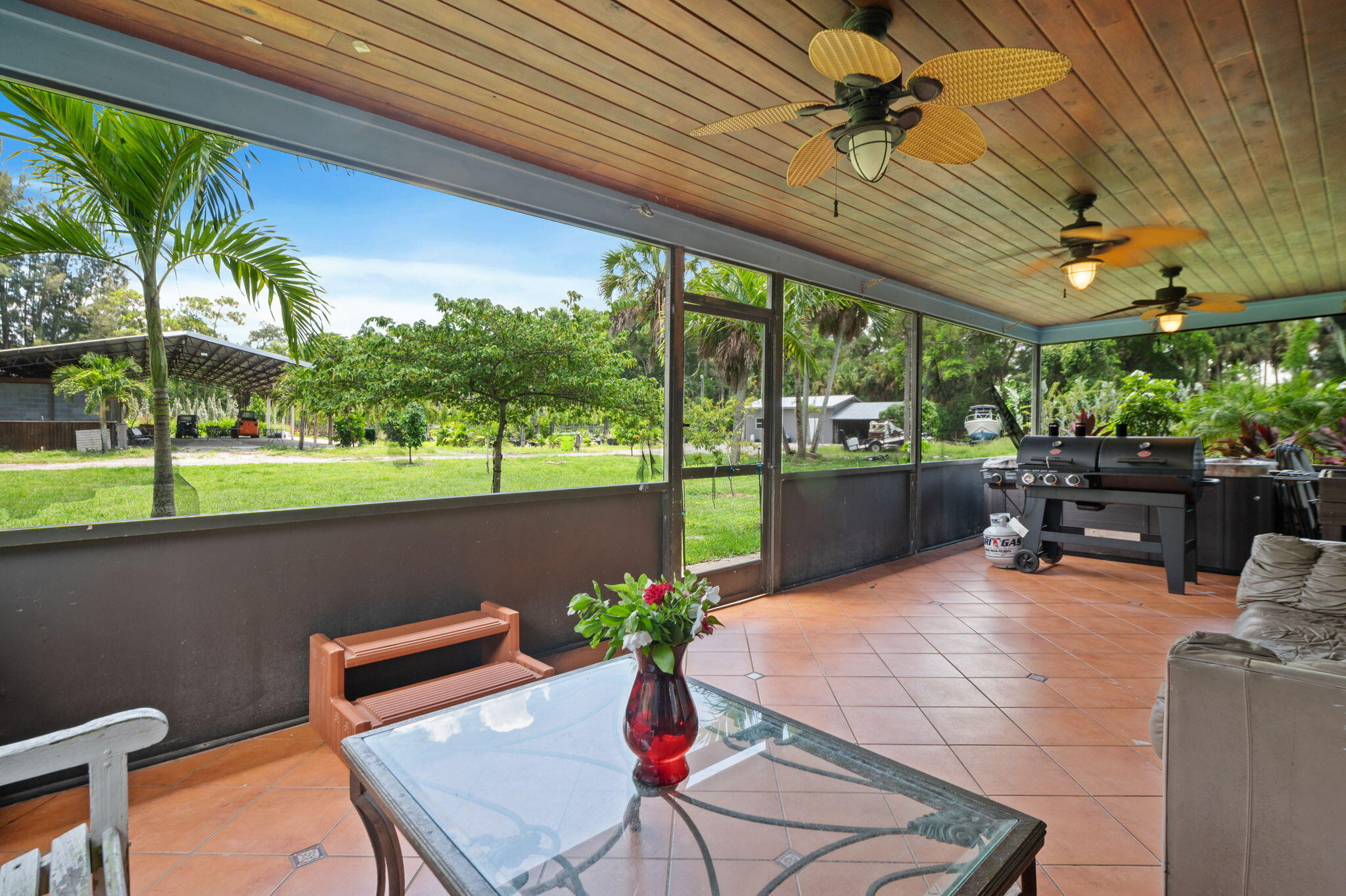 2587 E Road Loxahatchee Groves, FL 33470 - Photo 23 of 46 a outdoor space with furniture