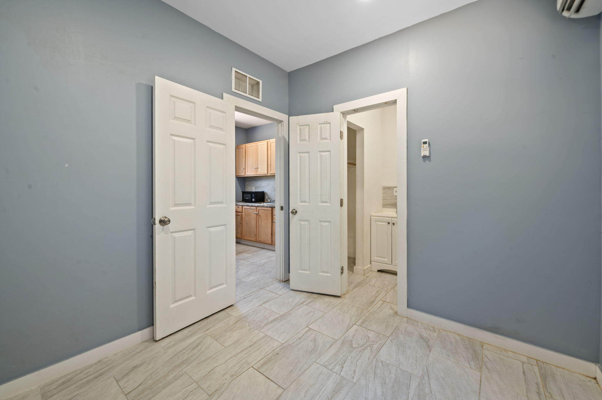 2587 E Road Loxahatchee Groves, FL 33470 - Photo 29 of 46 a view of a hallway with closet area