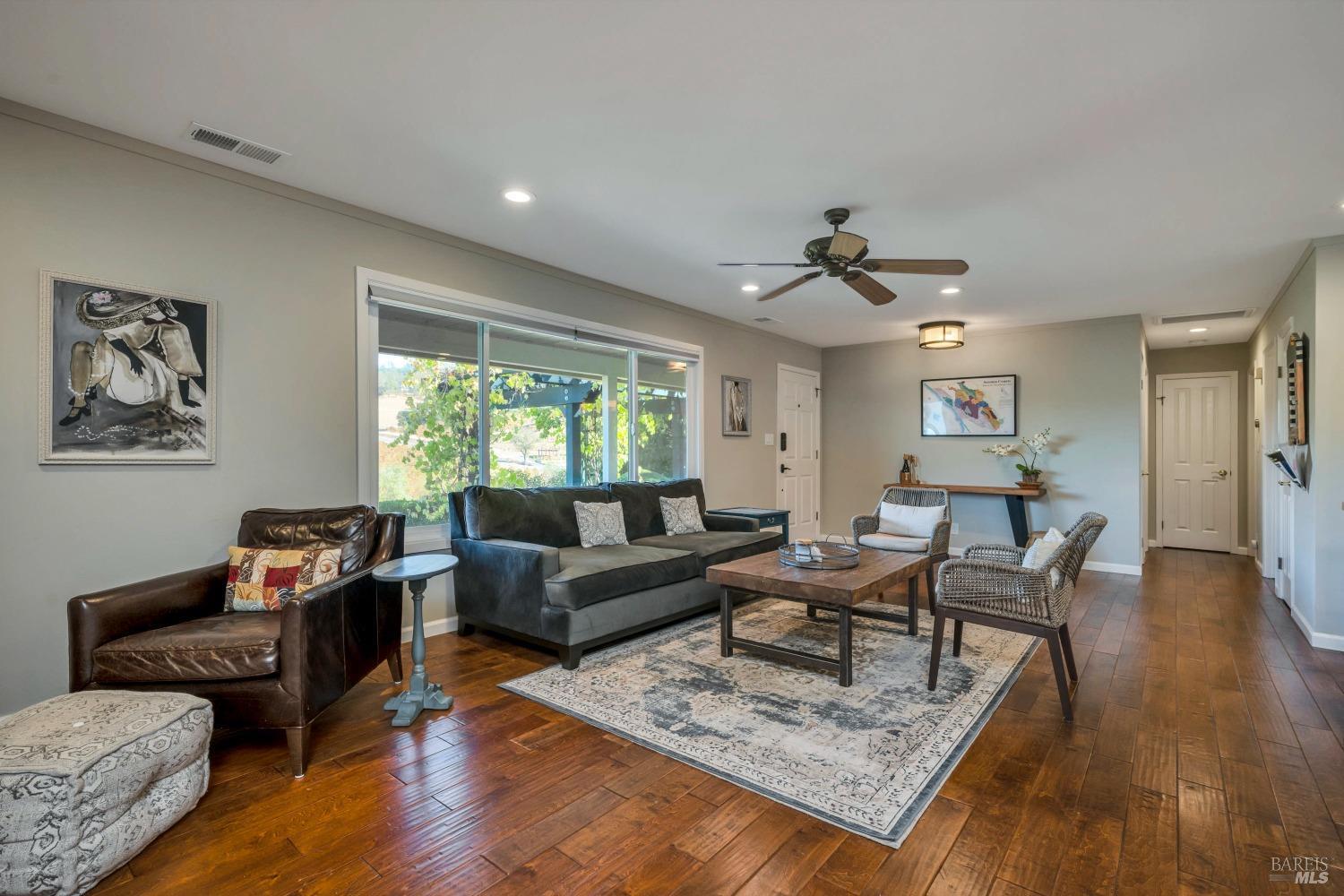 1389 Canyon Road Geyserville, CA 95441 - Photo 21 of 59 a living room with furniture and a large window