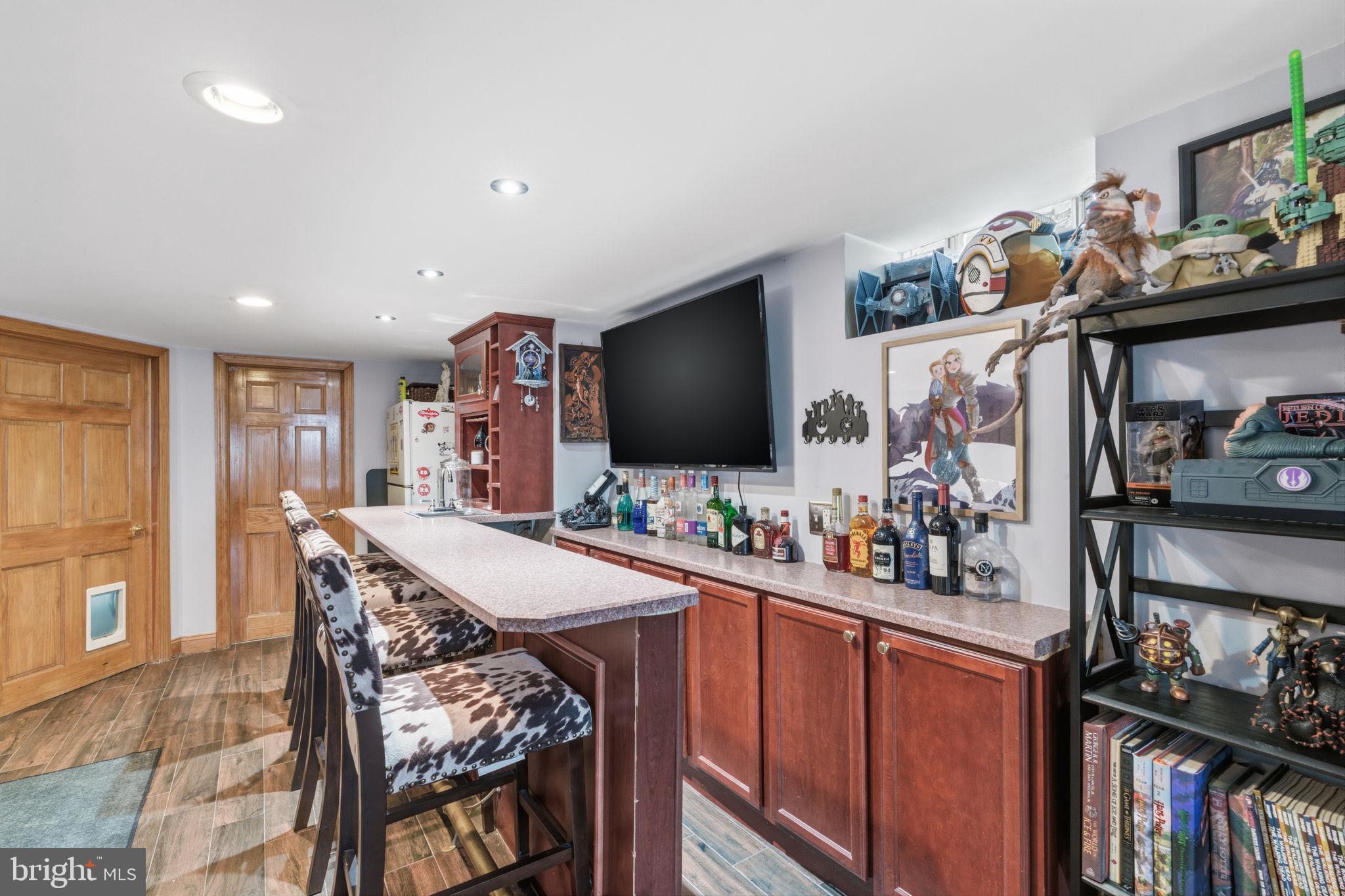 729 Chandler Street Philadelphia, PA 19111 - Photo 26 of 32 9.5' bar with TV and plenty of seating