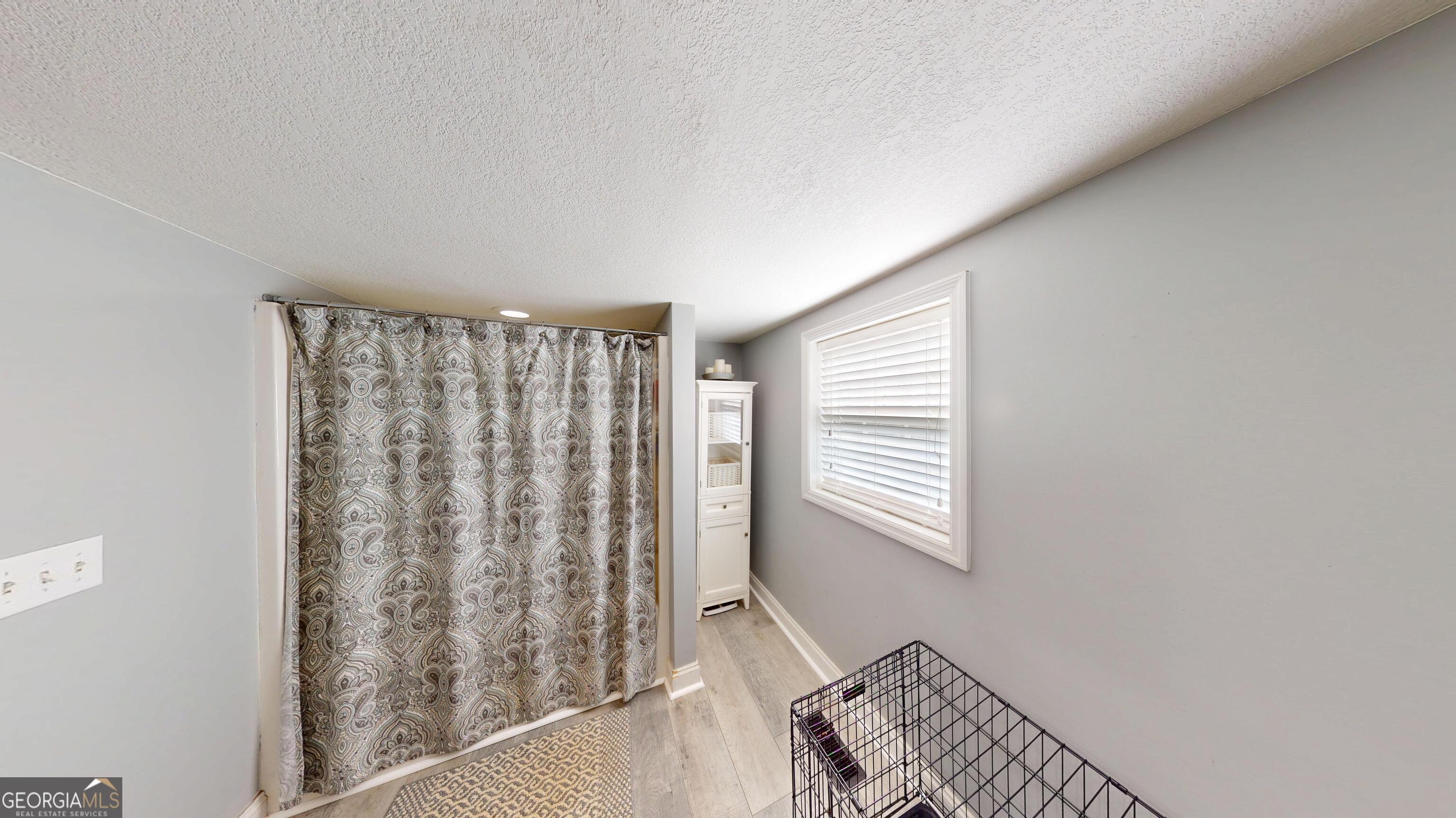 184 Eagle Pass Swainsboro, GA 30401 - Photo 12 of 49 a view of a room with windows
