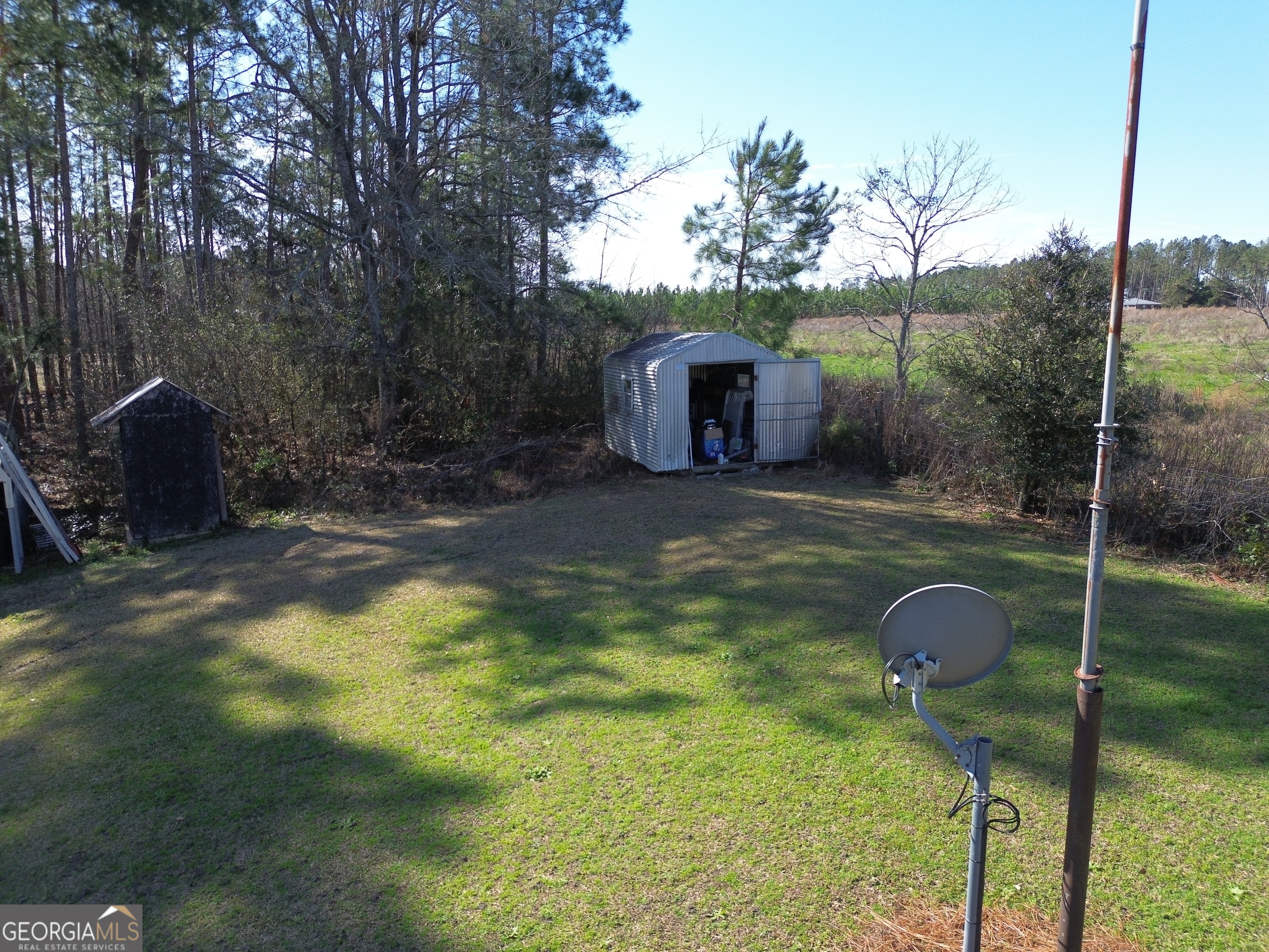 184 Eagle Pass Swainsboro, GA 30401 - Photo 38 of 49 a view of a small yard