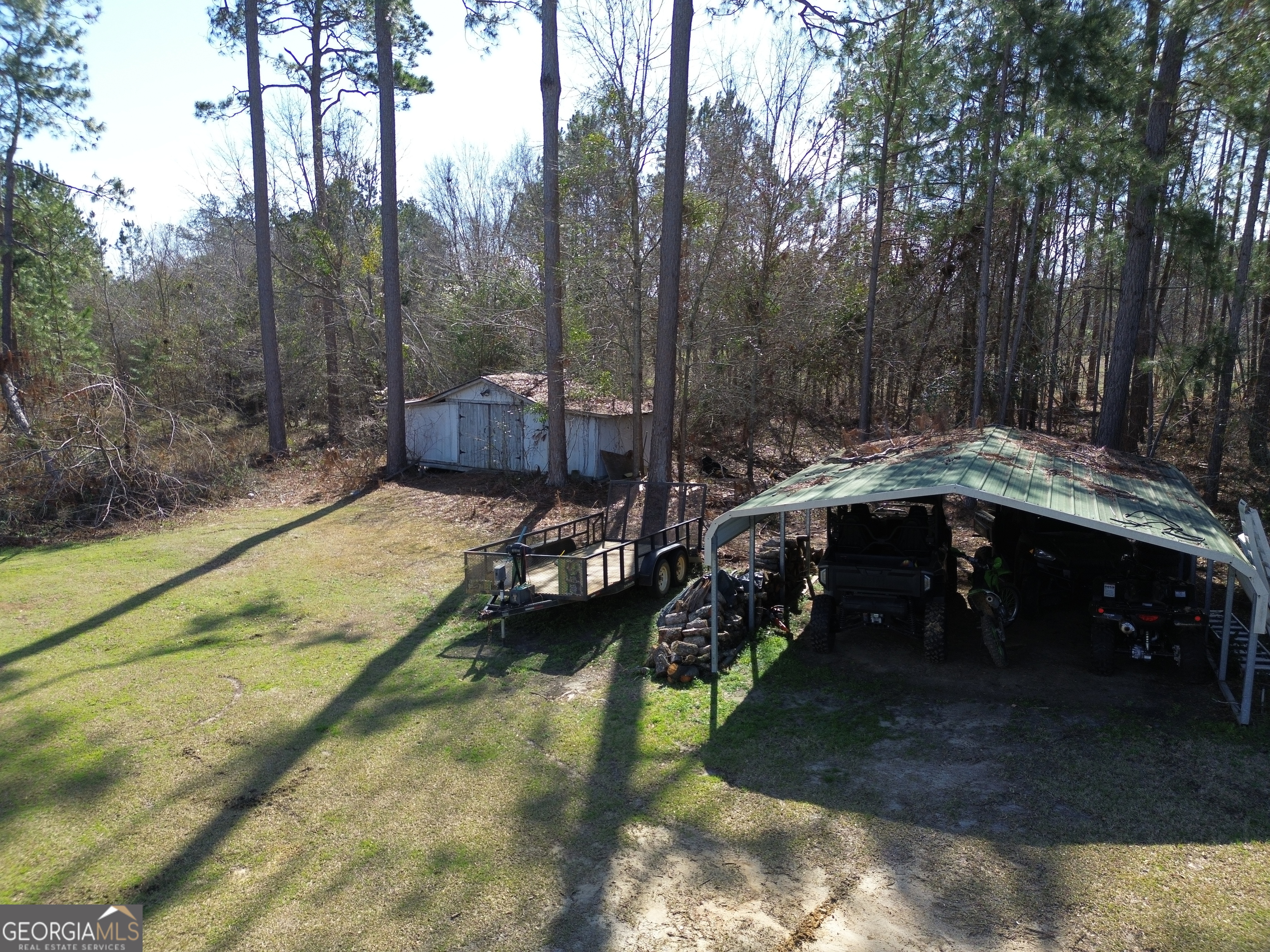 184 Eagle Pass Swainsboro, GA 30401 - Photo 40 of 49 a view of swimming pool with a yard