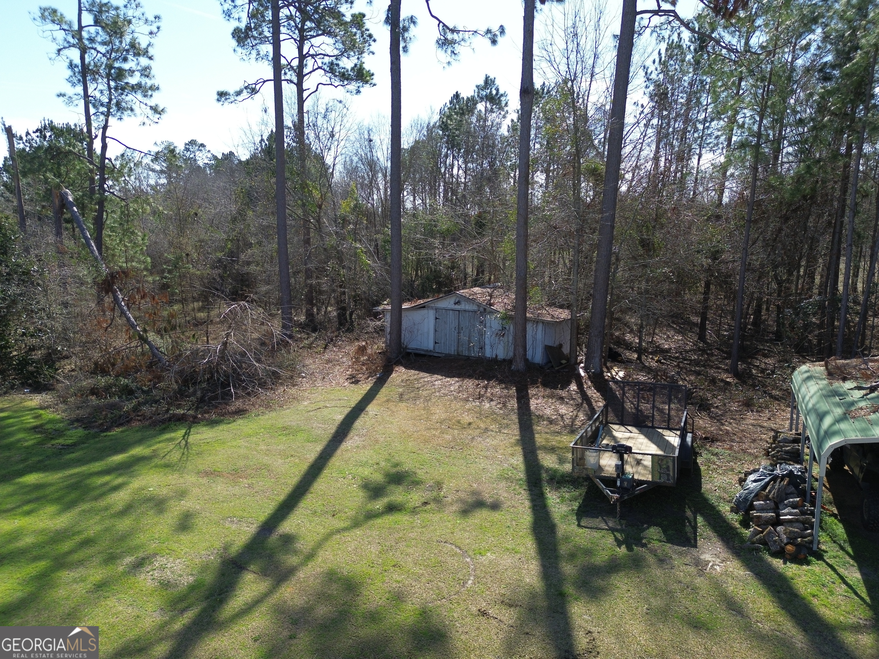 184 Eagle Pass Swainsboro, GA 30401 - Photo 41 of 49 a view of a yard with large trees