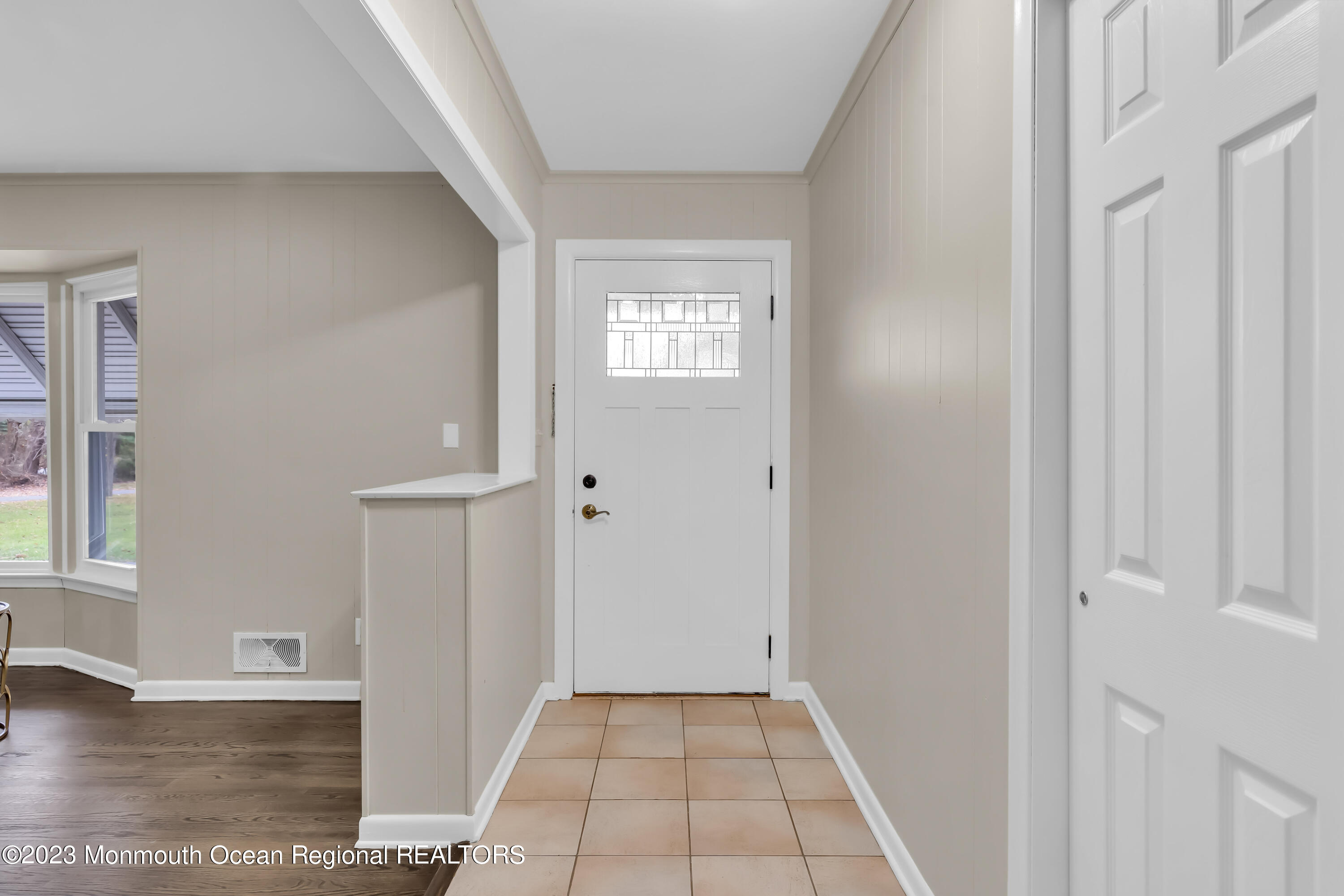 176 Bartley Road Jackson, NJ 08527 - Photo 16 of 51 a view of a hallway with wooden floor and staircase