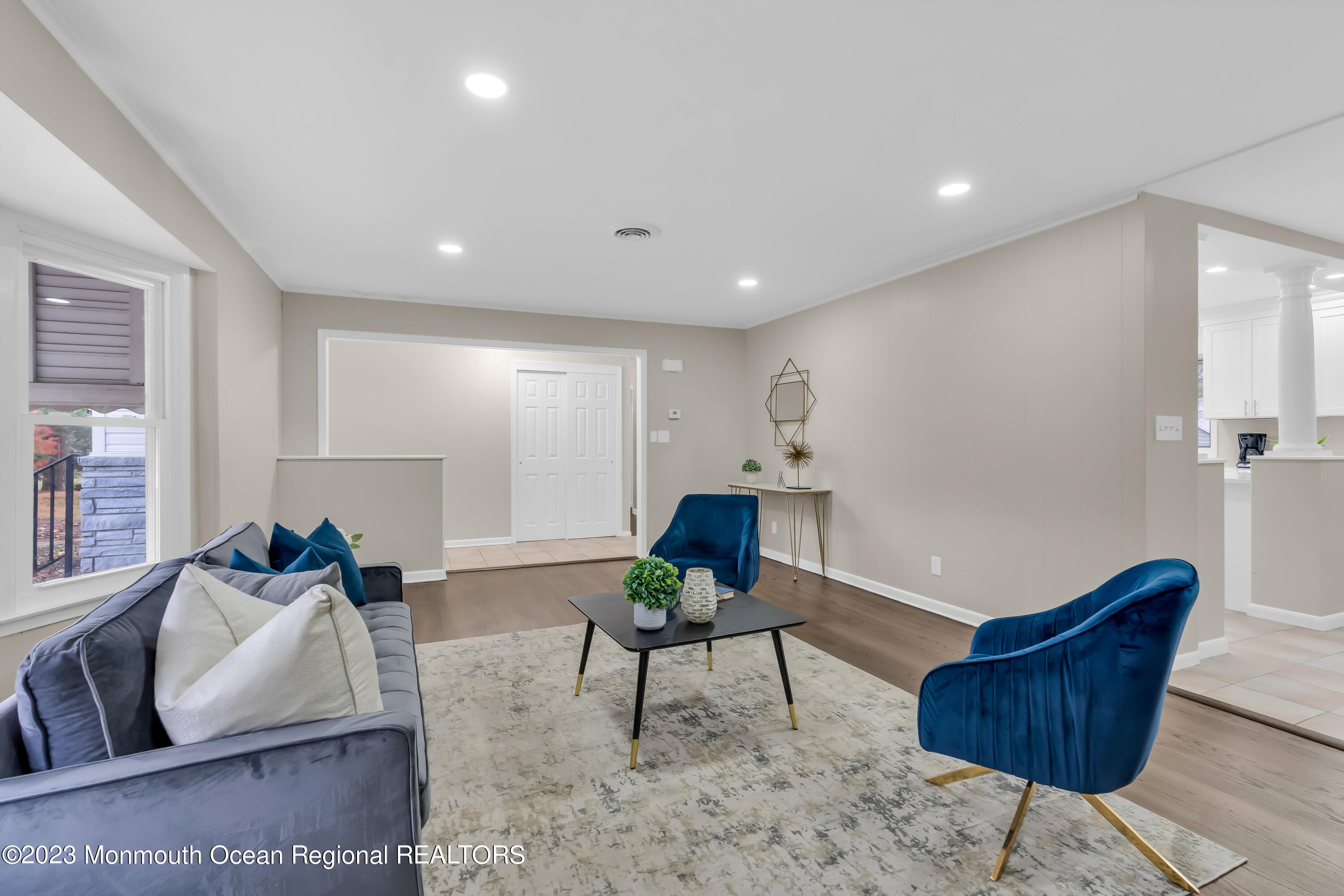 176 Bartley Road Jackson, NJ 08527 - Photo 21 of 51 a living room with furniture and a potted plant