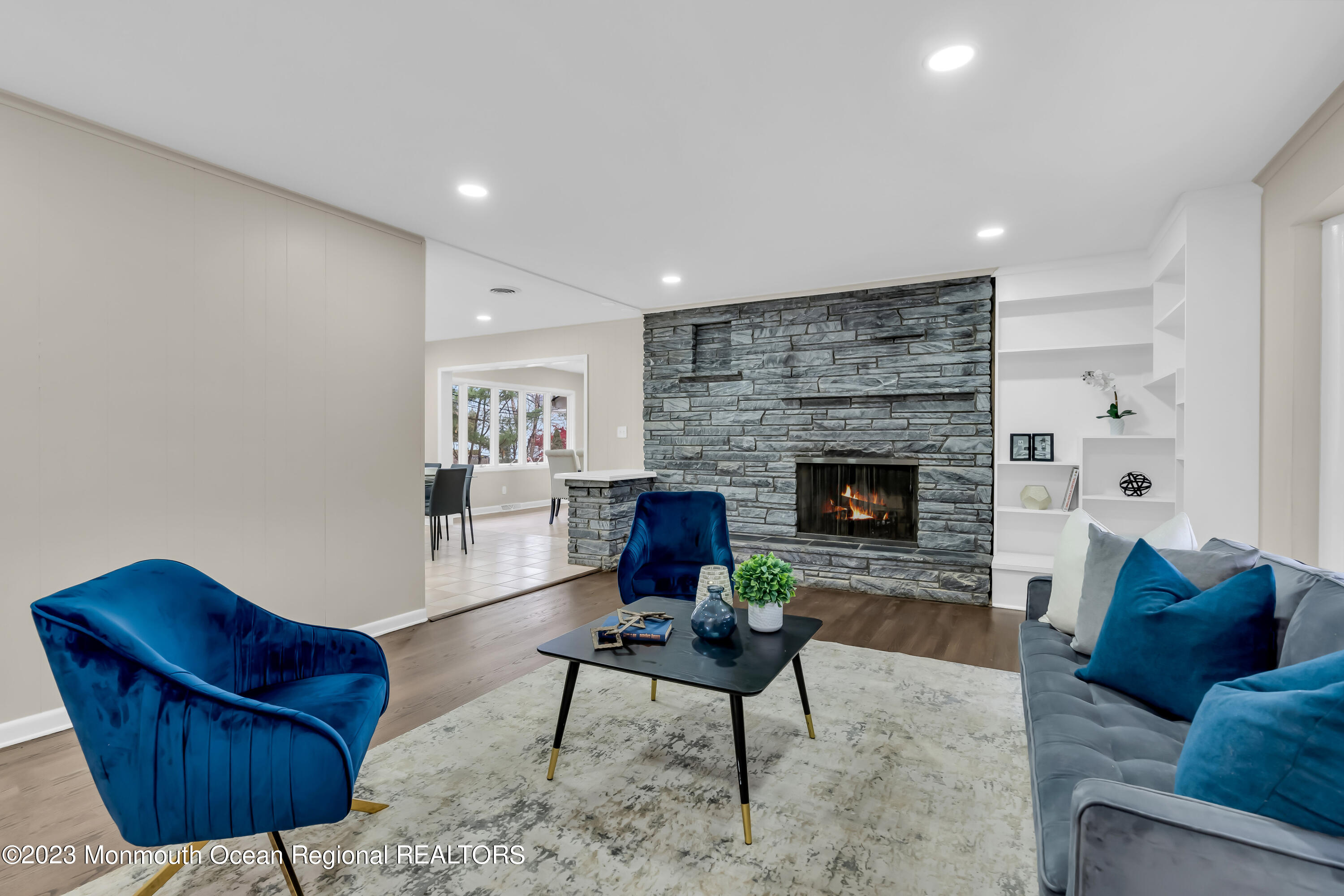 176 Bartley Road Jackson, NJ 08527 - Photo 24 of 51 a living room with furniture and a fireplace