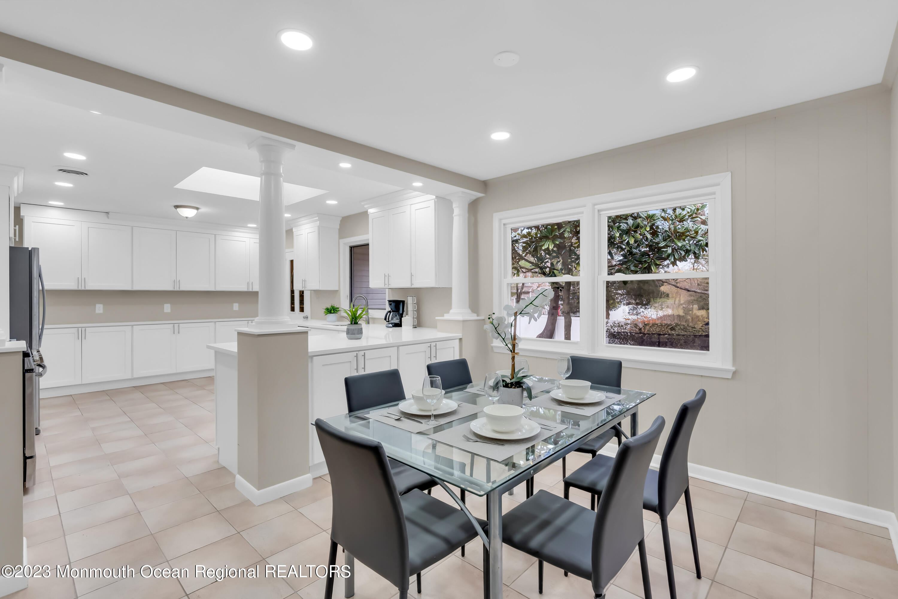 176 Bartley Road Jackson, NJ 08527 - Photo 25 of 51 a view of a dining room and a kitchen with a table chairs