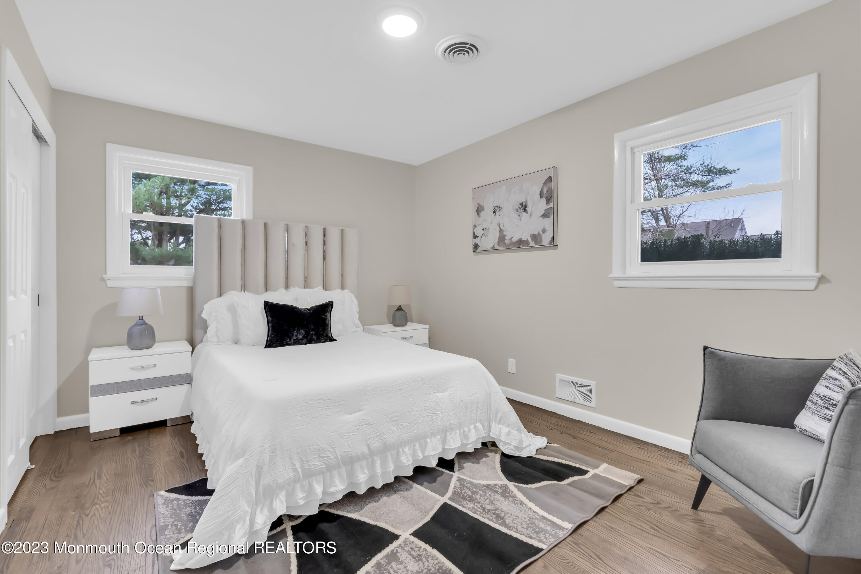 176 Bartley Road Jackson, NJ 08527 - Photo 42 of 51 a bedroom with a bed and a couch