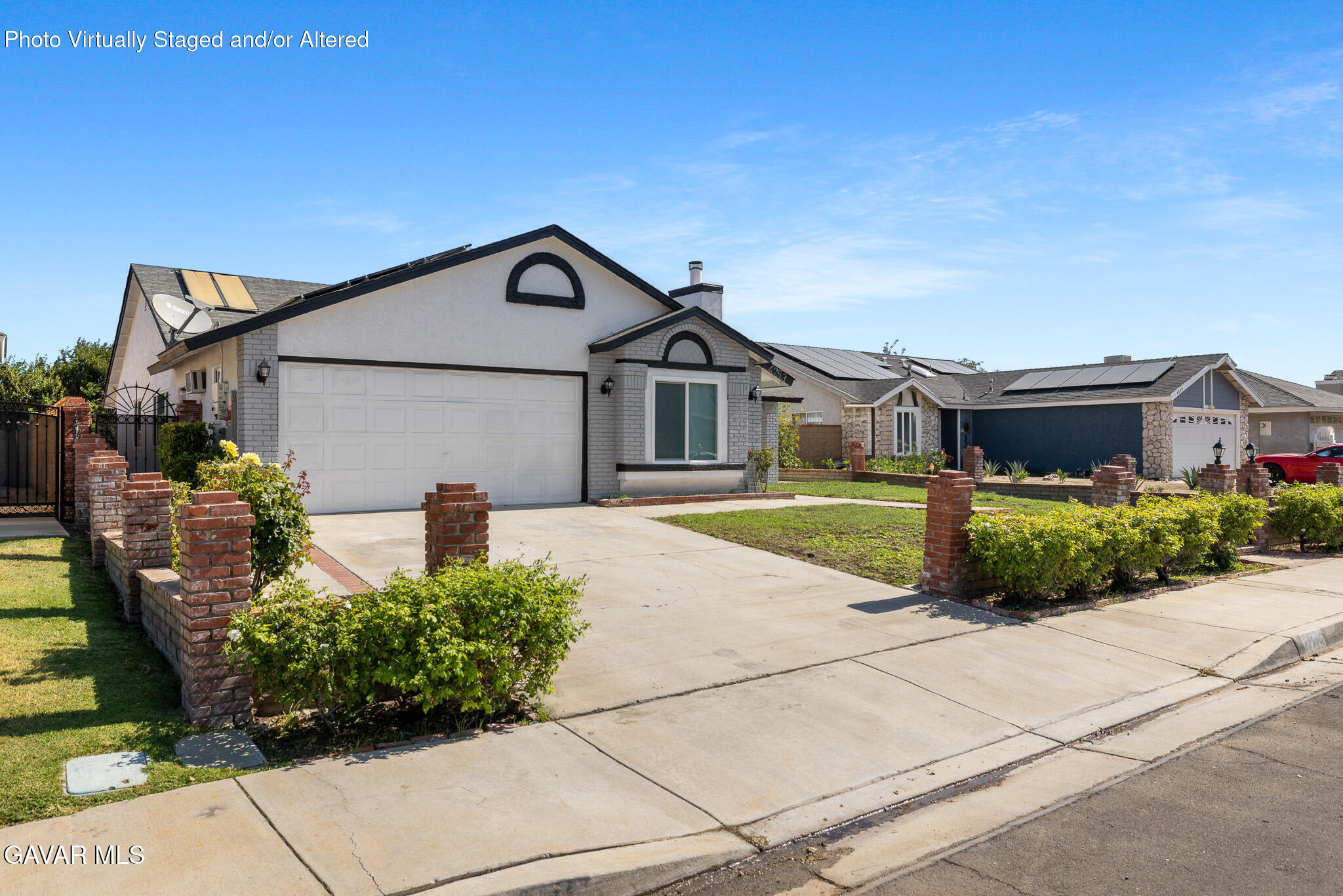 4753 East Ave R 11 Palmdale, CA 93552 - Photo 3 of 41 a front view of a house with a yard